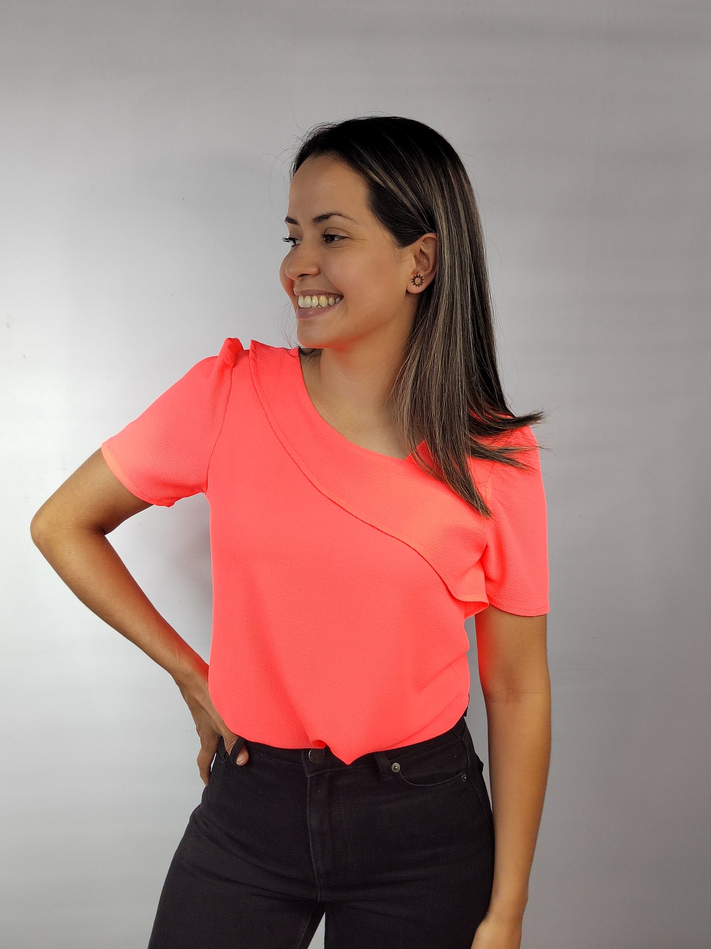 Blusa vuelo naranja neón