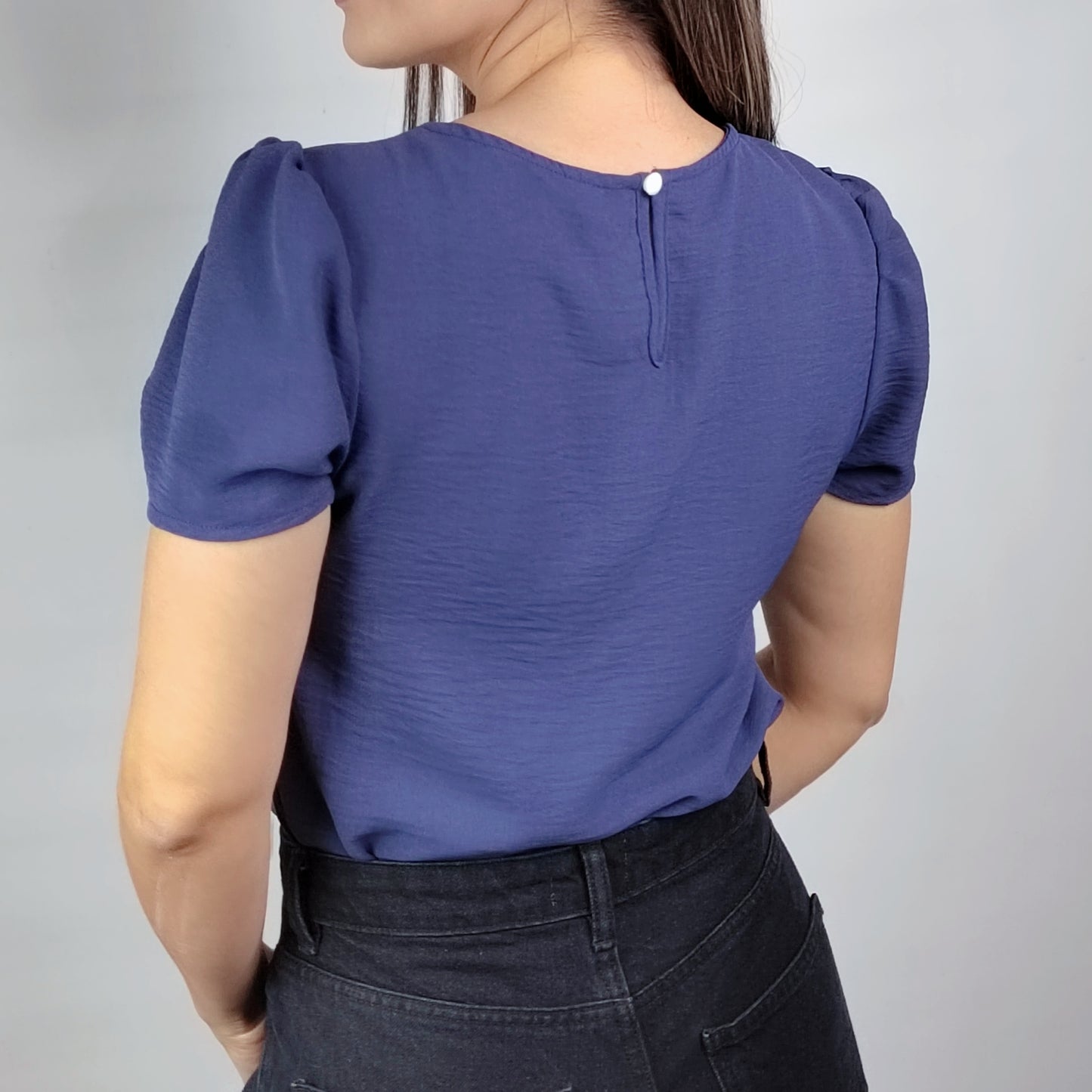 Blusa detalle en escote Azul